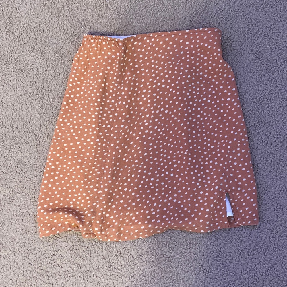 Pink and white polka dot skirt
